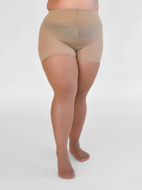 Close-up of the legs in the Sheer Shaping Tights 30D in Dune, showing the sheer, barely-there finish in plus size panty.